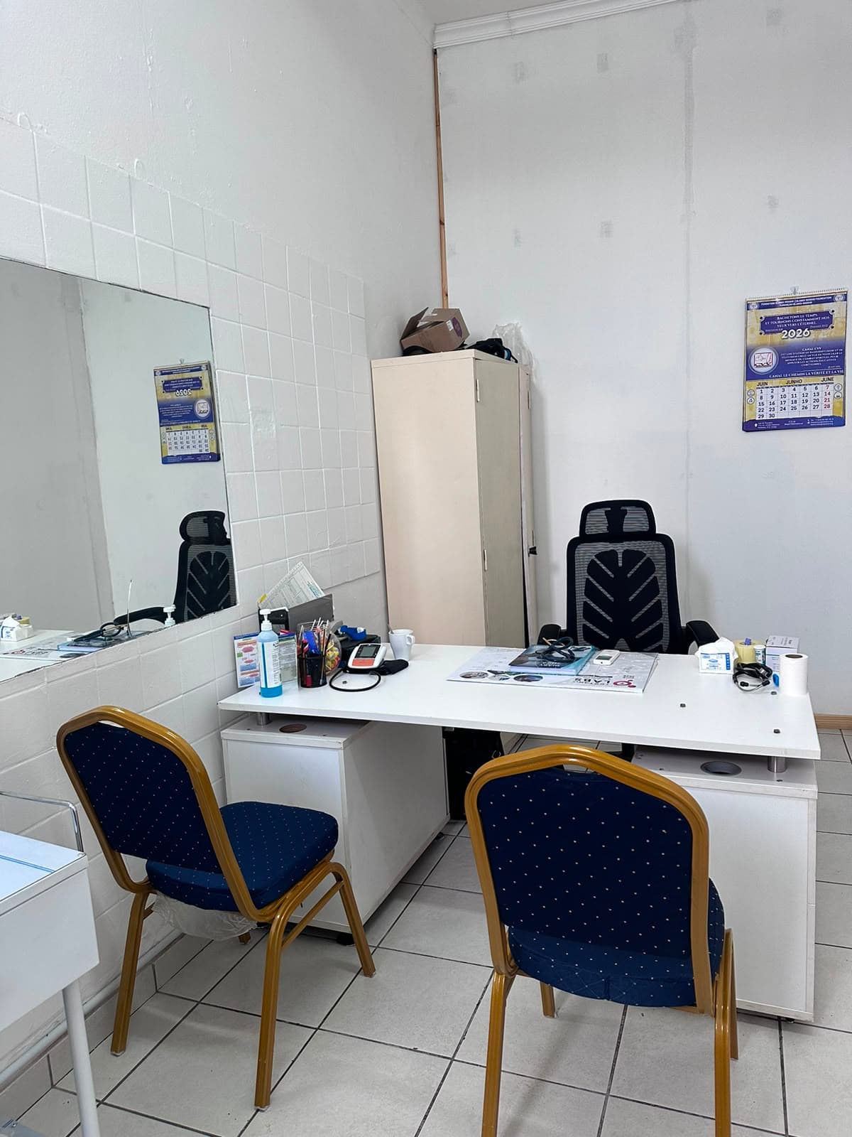 A doctor's consultation desk inside the practice